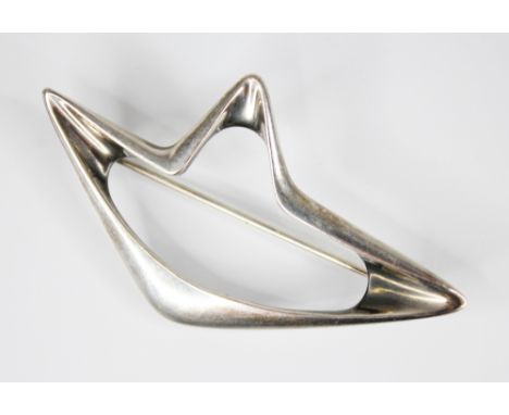 Henning Koppel for Georg Jensen, a silver amoeba brooch, of pierced abstract form, hinged pin and safety loop to reverse, des