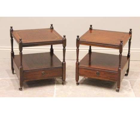 A pair of mahogany bedside/lamp tables, late 20th century, the square crossbanded tops raised upon slender supports above the