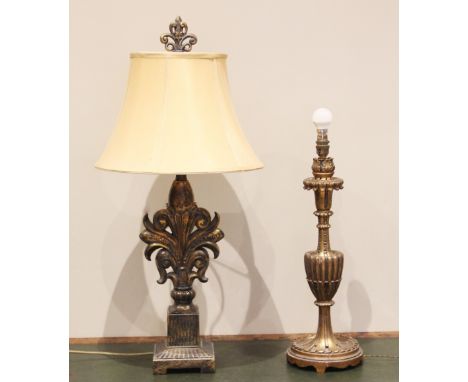 A carved giltwood table lamp, late 20th century, the scrolling leafy column raised upon an integrated plinth base, 50cm high 