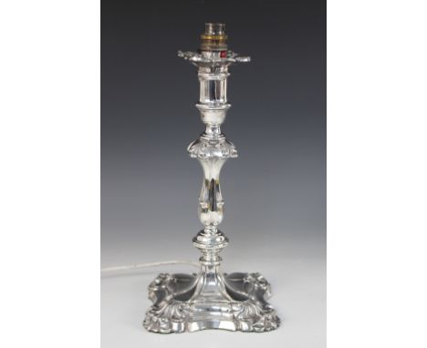 A Victorian silver candlestick, Carrington & Co, London 1891, converted to a lamp base, the fluted, knopped stem upon a shape