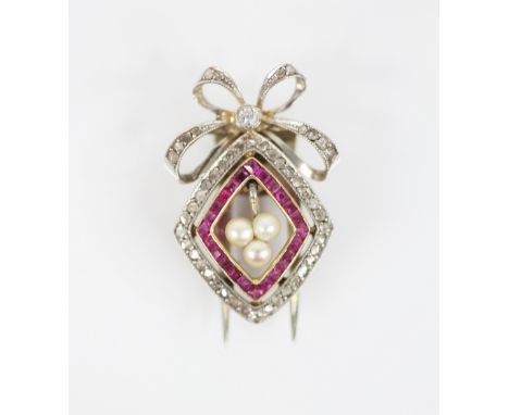 An early 20th century diamond, ruby and pearl dress clip, designed as a pearl cluster dropper, set to a diamond-shaped surrou