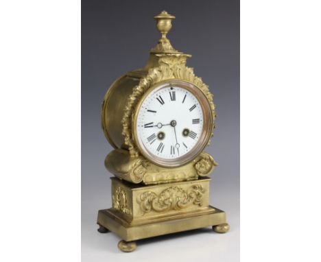 A late 19th century French gilt metal drum dial type mantel clock by A D Mougin, the 10cm white enamelled dial applied with R