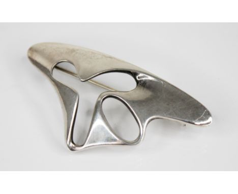 Henning Koppel for Georg Jensen, a silver 'amoeba' brooch, of pierced abstract form, hinged pin and safety loop fastening to 