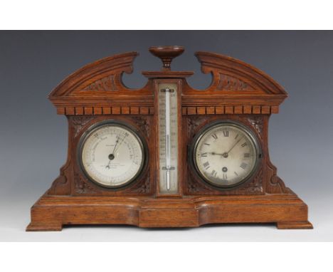 A late Victorian oak cased combination barometer-timepiece, the architectural case enclosing a central thermometer flanked by