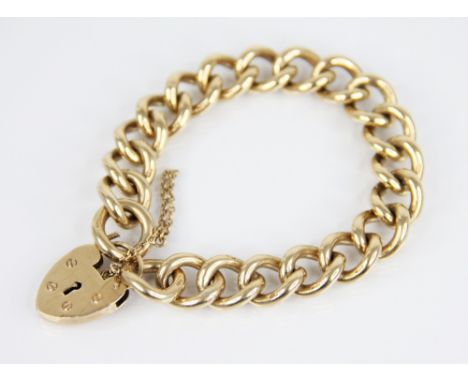 A 9ct gold curb link bracelet, with a heart-shaped padlock fastening, padlock marked 'S&amp;K', London 1971, 19cm long, weigh