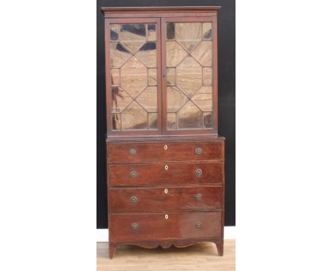 A George III mahogany library bookcase, outswept cornice above a pair of astragal glazed doors, the projecting base with four