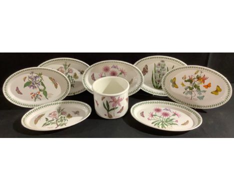 A set of seven Portmeirion Botanic Garden oval plates; another cylindrical utensils jar (8) 