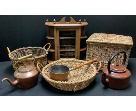 A wicker basket, a wicker pannier, others; a small glazed wall cupboard, with side shelves, 60cm x 51cm; a Victorian copper k