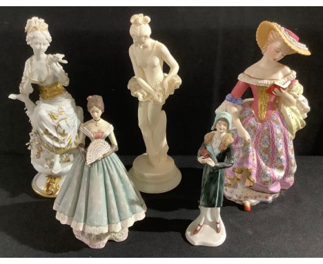 A Victoria and Albert Museum model of a lady in 18th century dress, number A2480; a Royal Worcester figure, Caroline; a Germa