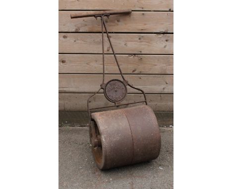 A garden roller, The Gamage Holborn