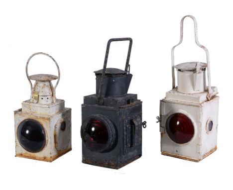 A Collection of three    British Railway lamps,   B.R. tail lamp in black, L.T. tail lamp in white and a large rear lamp in 