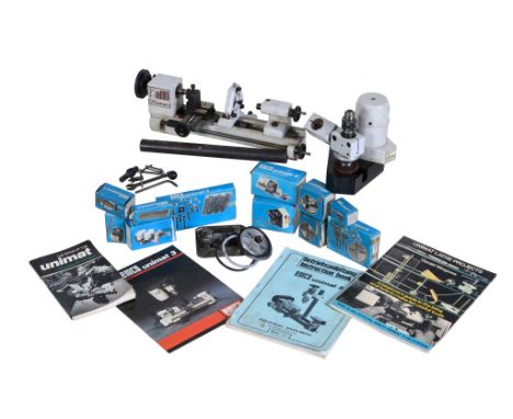  An Emco 3 model makers lathe,   with fitted cross-head guide, tool post, tail stock, belts and sundry attachments (boxed). 