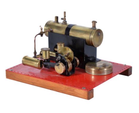  A Bowman M122 steam plant,   circa 1930. The brass horizontal boiler with fitted safety valve and whistle. The plant is spir