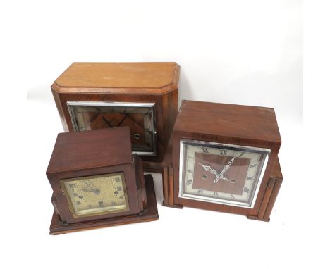 Three English Art Deco mantel clocks, two with silvered Roman chapter rings and the other with a brass dial (3).