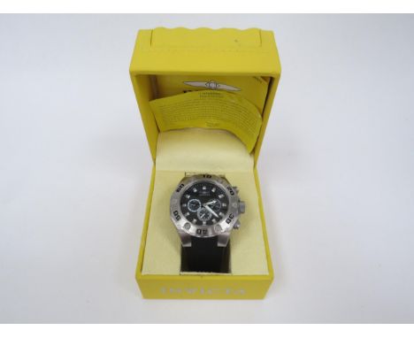 INVICTA: A gentleman's stainless steel cased Invicta Specialty Collection Tritnite chronograph wristwatch, on rubber strap. B