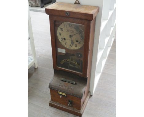 An oak cased National Time Recorder Co. Ltd. clocking-in clock, signed Arabic dial of St. Mary Cray, Kent. Approximately 98cm