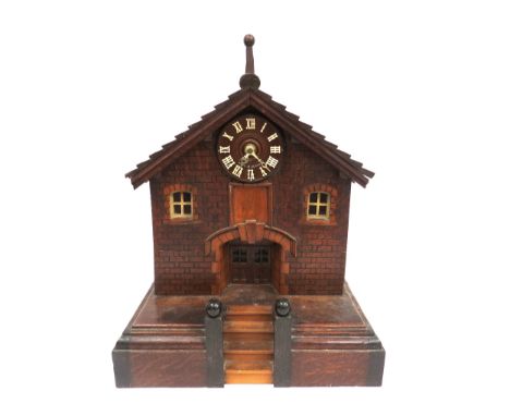 A German cuckoo style clock as a Swiss cottage, 37cm high