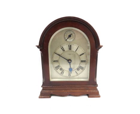 A chiming bracket clock by Sir John Bennett Ltd of London, silvered Roman dial with Fast/Slow subsidiary dial, brass movement