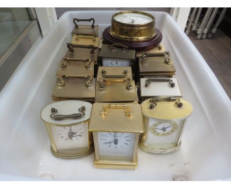 A quantity of modern Metamec carriage timepieces, with one Metamec wall clock.