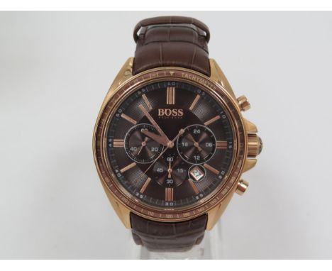 HUGO BOSS: A gentleman's stainless steel cased Hugo Boss chronograph quartz wristwatch on brown leather strap. Rose gold tone