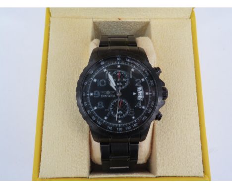 INVICTA: A gentleman's stainless steel cased Invicta Specialty Collection Tritnite chronograph wristwatch in black. Black dia