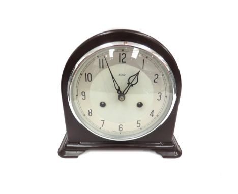 A Smiths Enfield Art Deco mantel clock in a brown bakelite case, Arabic dial with silvered chapter ring, signed movement stri