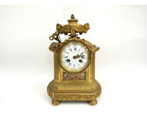 A 19th Century ormolu mantel clock by Lévy Freres of Paris, goat mask urn finial, enamel dial with blue Roman numerals and ou