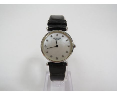 LONGINES: A ladies La Grande Classique de Longines stainless steel wristwatch, mother-of-pearl dial with diamond markers, on 