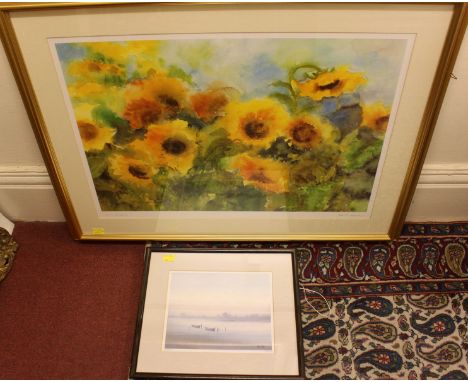 A large signed print of sunflowers by Ute Mertens, together with another signed print, (2)