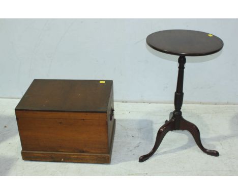 A 19th century small stained mahogany circular tilt-top occasional table together with a small stained pine trunk with lift-o