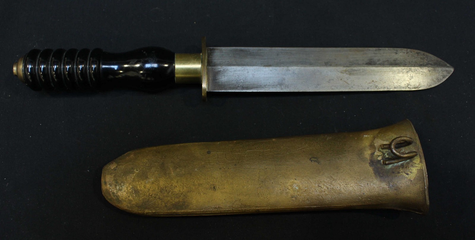 A Siebe Gorman & Co. A brass divers knife, with heavy brass scabbard