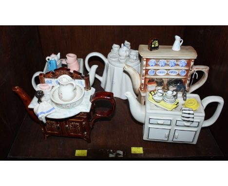 SECTION 51.  Five various novelty ceramic teapots, one modelled as a traditional farmhouse kitchen dresser with plates on dis