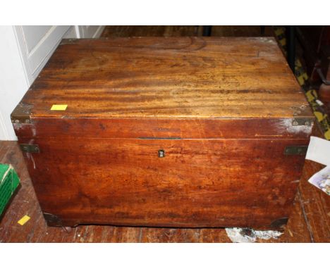 A Victorian Camphor wood travelling trunk, with brass banding, with brass carrying handles and supported on castors.  61 cm w