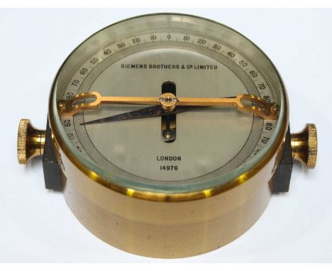 An unusual Siemens brass compass, the silvered dial with each quarter reading 0-90 degrees, with double ended needle and bras