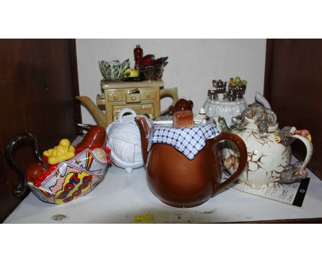 SECTION 9.  An assortment of novelty ceramic teapots including a limited edition 'Harmony Kingdom' teapot modelled as an egg 