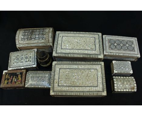 A collection of ten Eastern inlaid trinket boxes, of various shapes and sizes, all inlaid with mother pearl and bone.