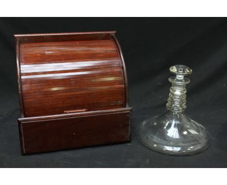 An early 20th century stained mahogany tambour-front stationary box, together with a Georgian style three-ring ship's decante
