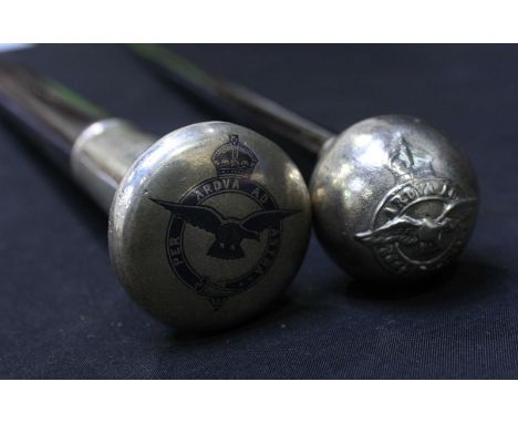 A silver niello topped RAF walking stick, the top with RAF crest, the side engraved with a palm tree, together with an RAF sw