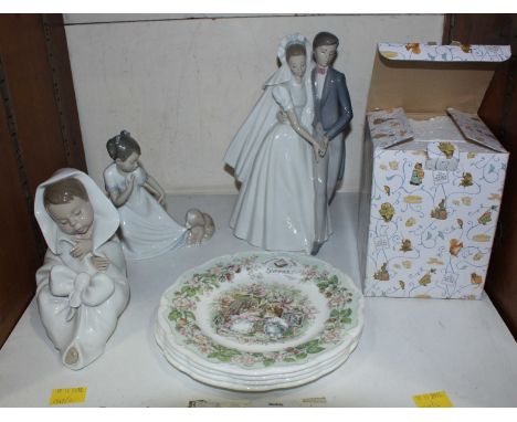 SECTION 31. Three Nao porcelain figures, a marriage couple, a girl with puppy and a girl in blanket, together with four Royal