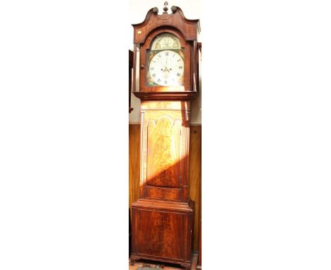 A George III mahogany eight day long case clock by W. Sutcliffe of Barnley, the arched top painted dial with subsidiary secon