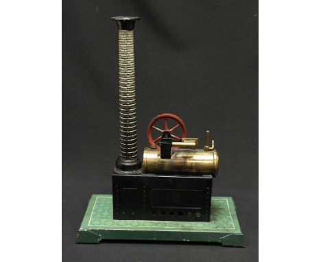 An early 20th century German Bing tin plate static steam engine, with long painted chimney, lacking burner tray.29 cm high.