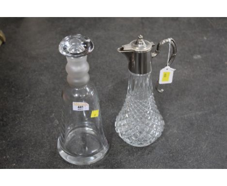A claret jug and a decanter