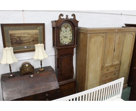 A Victorian oak and mahogany cased 8 day longcase clock with moon phase and in the Scottish style with pendulum and two weigh