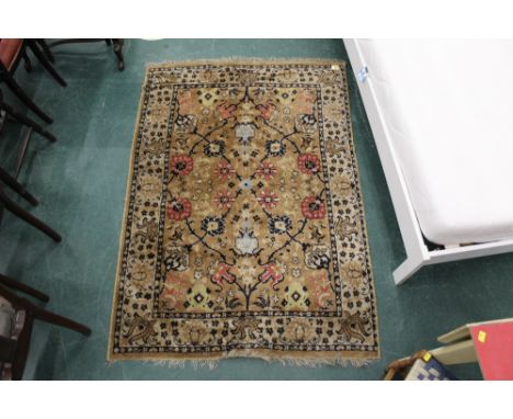A light brown patterned and tasselled rug, 168 cm long including tassles