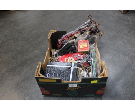 A box of costume jewellery, wristwatches, vintage Peek Frean biscuit tin etc