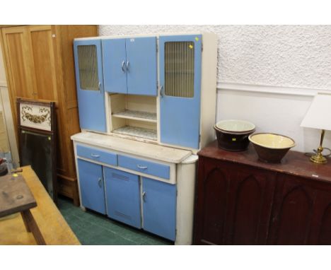 A mid century vintage kitchen unit painted in blue, 180 cm high, 135 cm wide