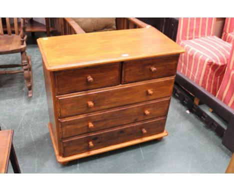 A stained modern pine 2/3 chest of drawers, 76 cm high