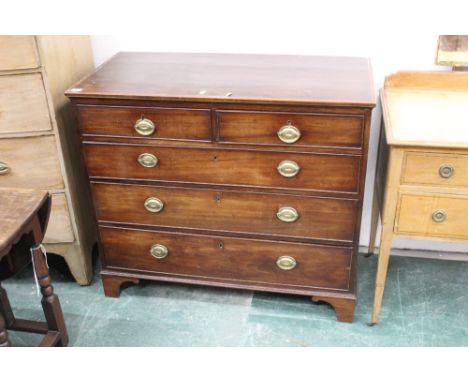 A Georgian mahogany chest of drawers with boxwood stringing and measuring 91 cm high x 94 cm wide  