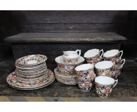 A gilt and floral decorated tea set