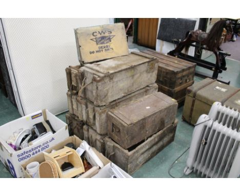 Eight vintage wooden ammunition boxes with rope handles
